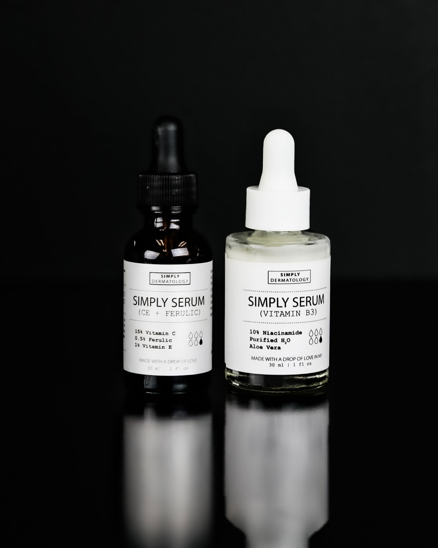 Radiance and Repair Duo from the Simply Collection on a black background